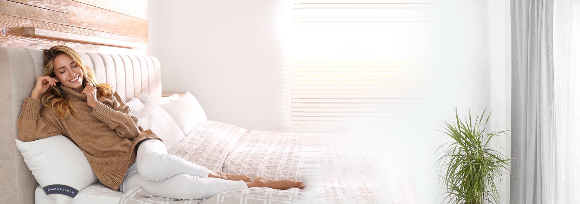 Woman sitting on mattress